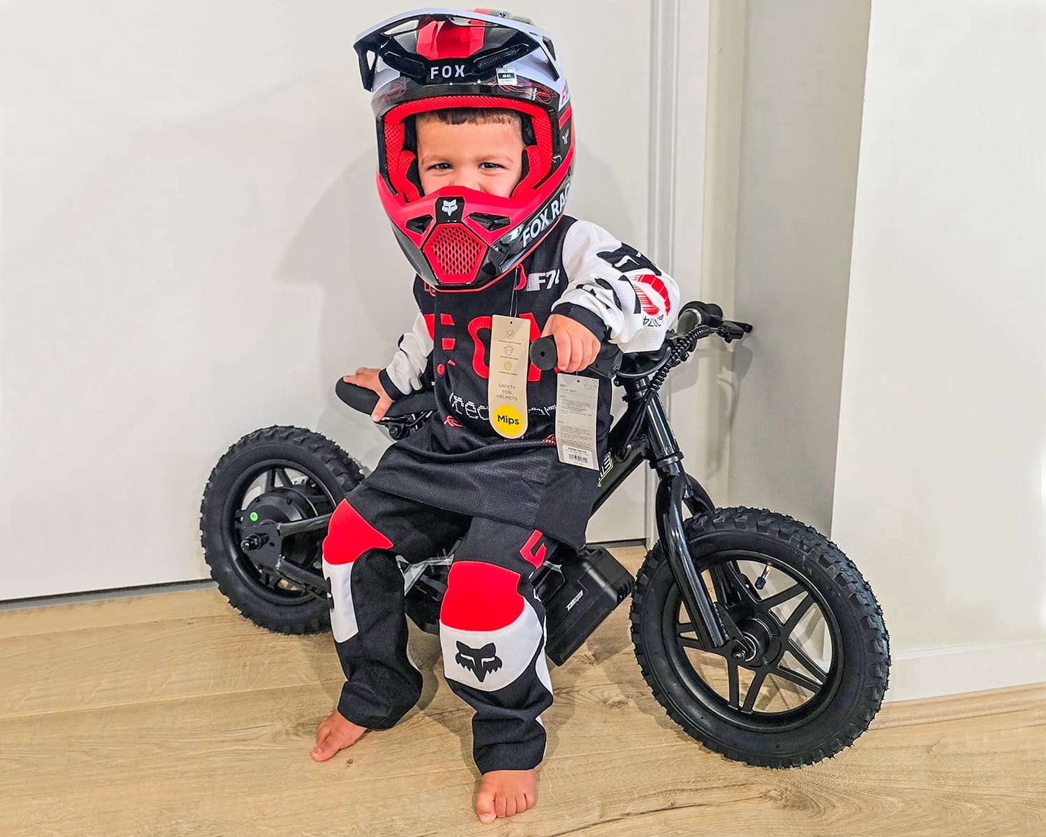 A child wearing a helmet