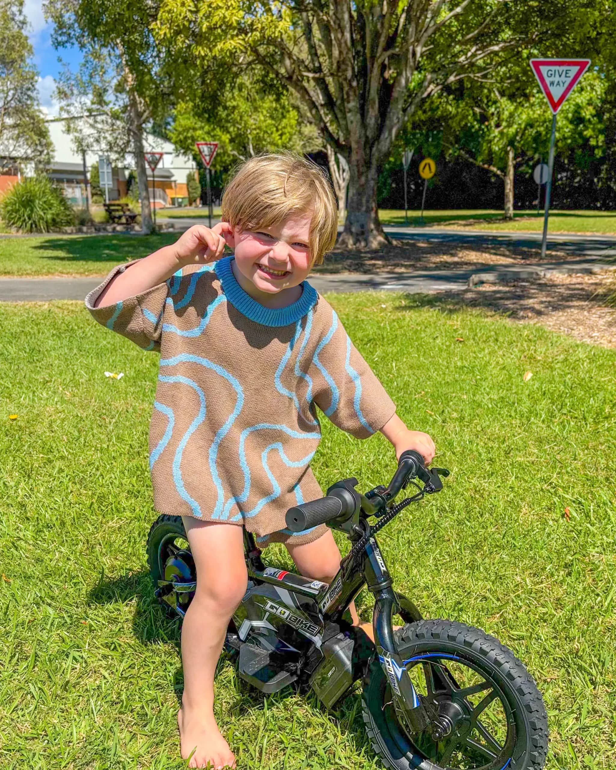Two Australian dads with their kids and electric balance bikes
